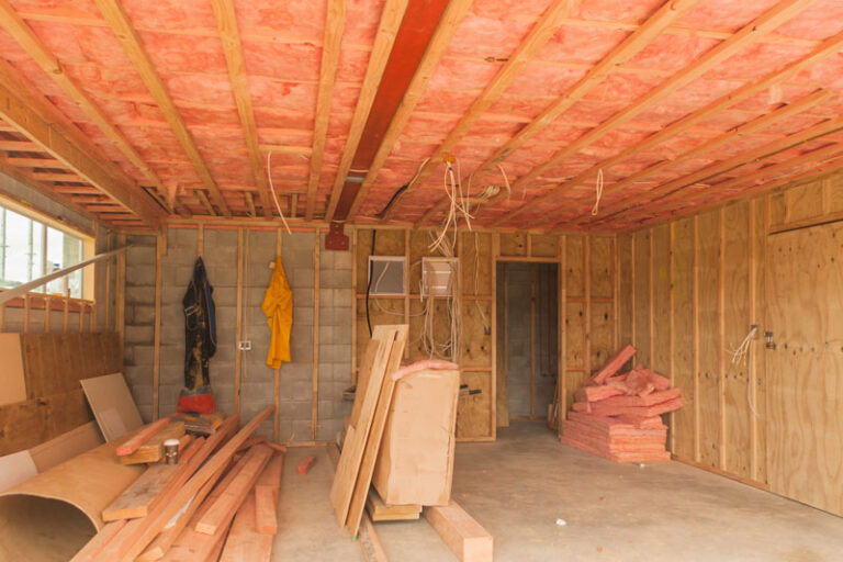 Fiberglass insulation in garage for above living space