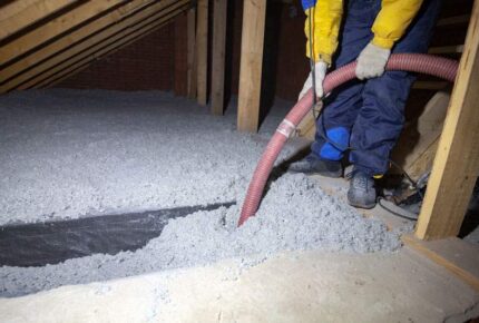 blowing in cellulose insulation into an attic